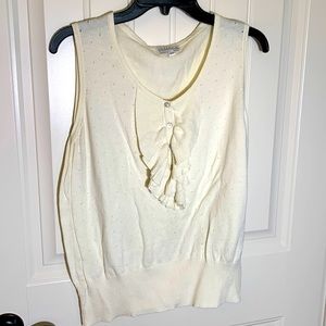 Sleeveless sweater. Great under jackets or shrugs.